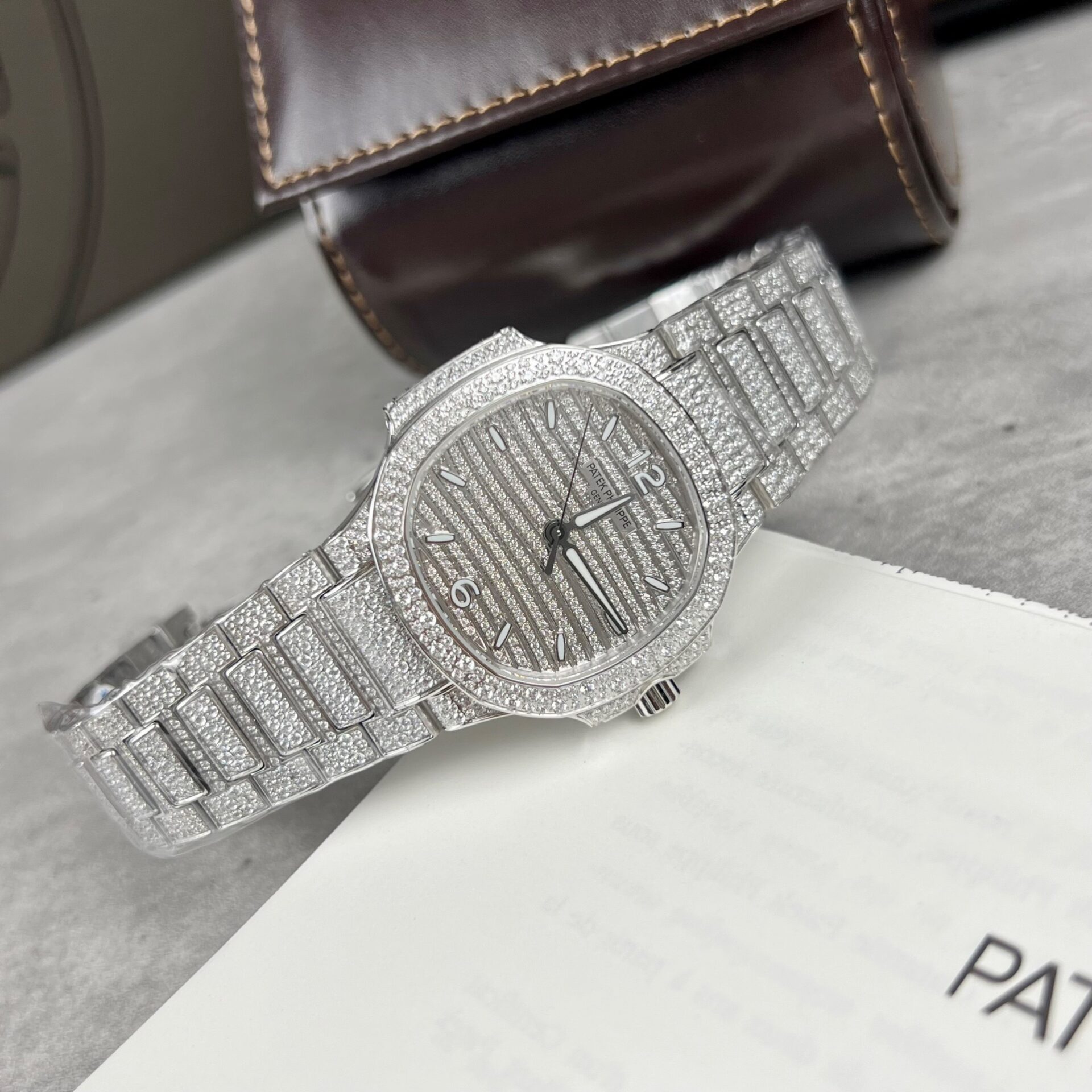 056D1C2B-7F49-6D22-C4BA-6D052AB3B111.jpg Patek Philippe Nautilus 7118 Full Diamond Replica Watch 35.2mm - Image 1