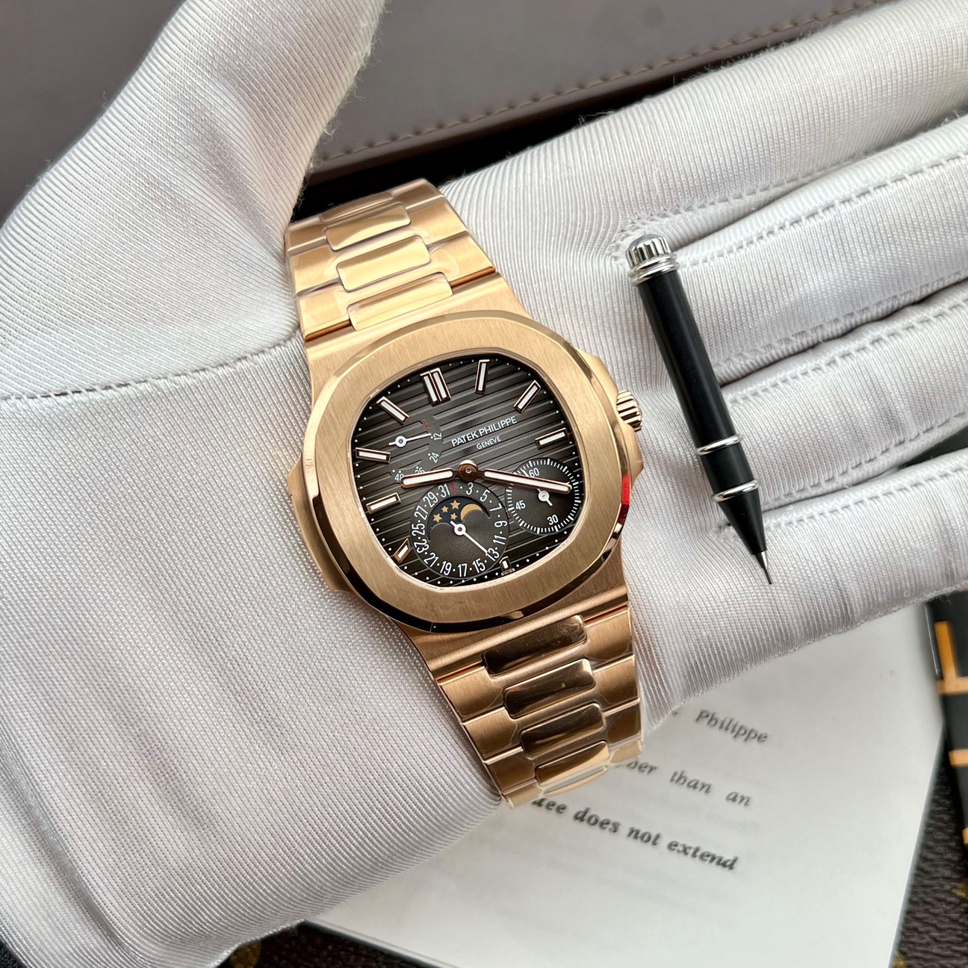 2C3C40E7-E7C4-E501-89DB-FCB6B6DE5554.jpg Patek Philippe Replica 1:1 Watch Nautilus 5712 Rose Gold Factory PPF V2 40mm - Image 1