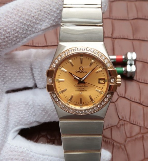 45293BEF-F0E3-083C-7670-26432E518C55.jpg Replica Omega V6 Constellation 35mm Diamonds Bezel YG Dial SS Bracelet A2500 - Image 1