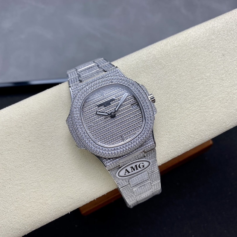 62EE7F20-571F-8D4C-38FE-735AEF8F6548.jpg Fake Diamond Watch Patek Philippe Replica 5719/1G-001 Nautilus 40mm White Gold Diamond Pave White Gold Diamond Set Automatic AMG(1:1 replica) - Image 1
