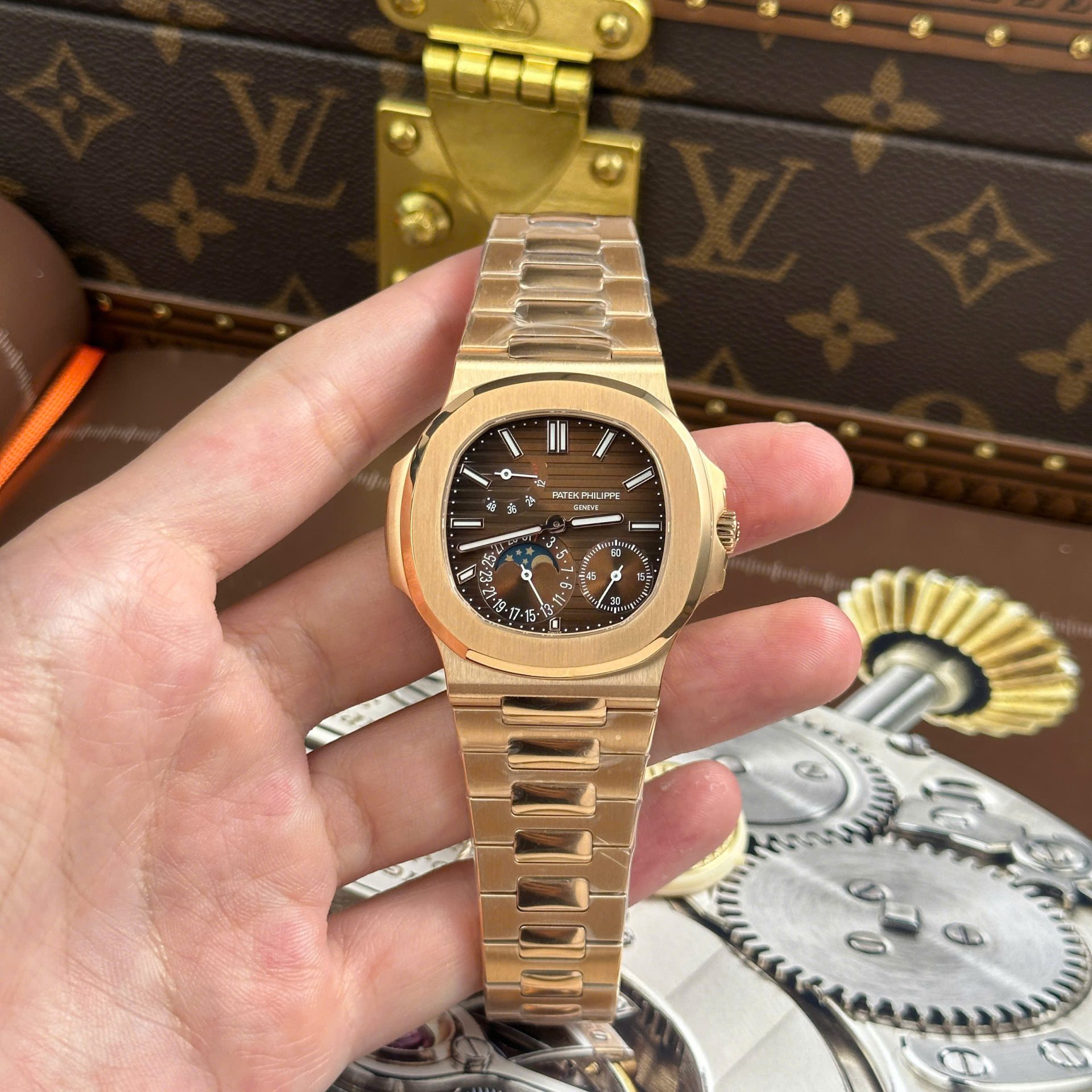 6CE66709-6D4C-D456-1EE5-B2632452A3D4.jpg Patek Philippe Nautilus 5712R Knock Off Watches Brown Dial Metal Wire PPF Factory Version 3 40mm - Image 1