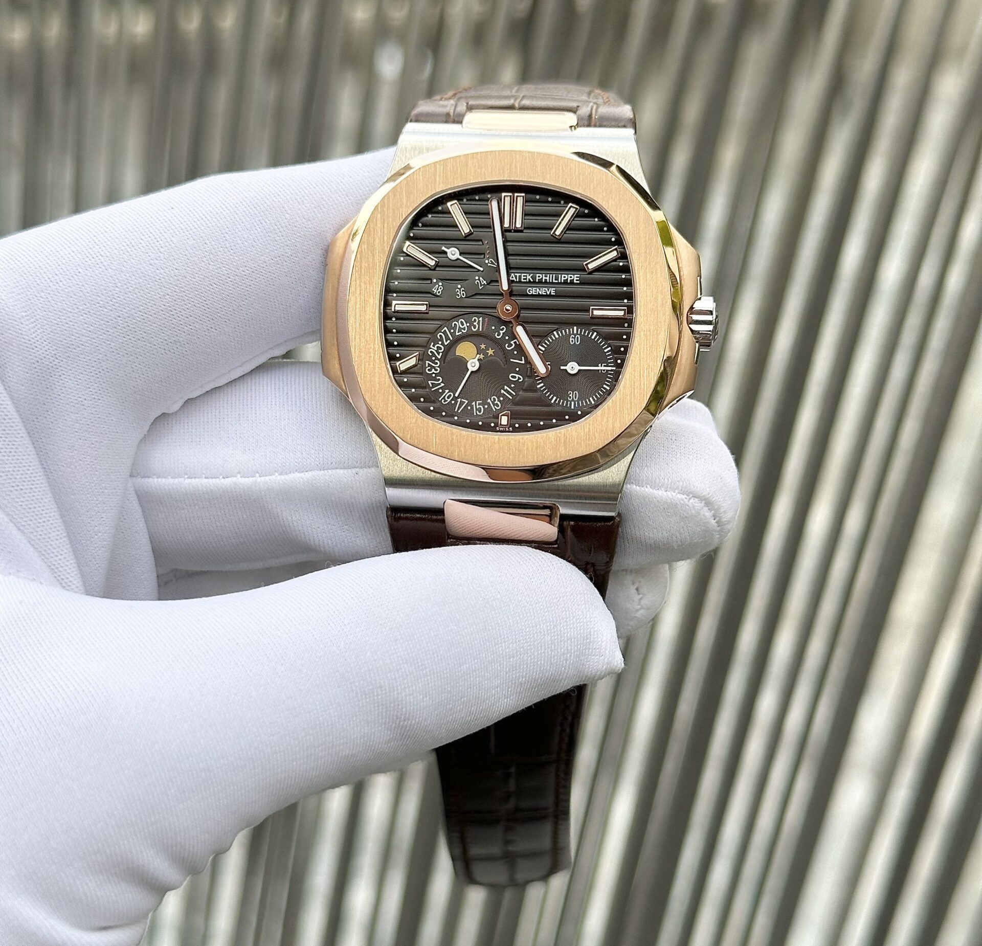 9AA75E05-B360-EDD9-5025-03D0766EE59F.jpg Patek Philippe Nautilus 5712 Demi Rose Plated Leather Strap Rep 11 Watch Factory GR 40mm - Image 1