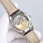 Fake Patek Philippe Replica Watch 4948G-001 Complications Ladies Annual Calendar Moon Phase 38mm Black Tahitian Mother of Pearl Arabic White Gold Diamond Set Leather(1:1 replica) - Image 2