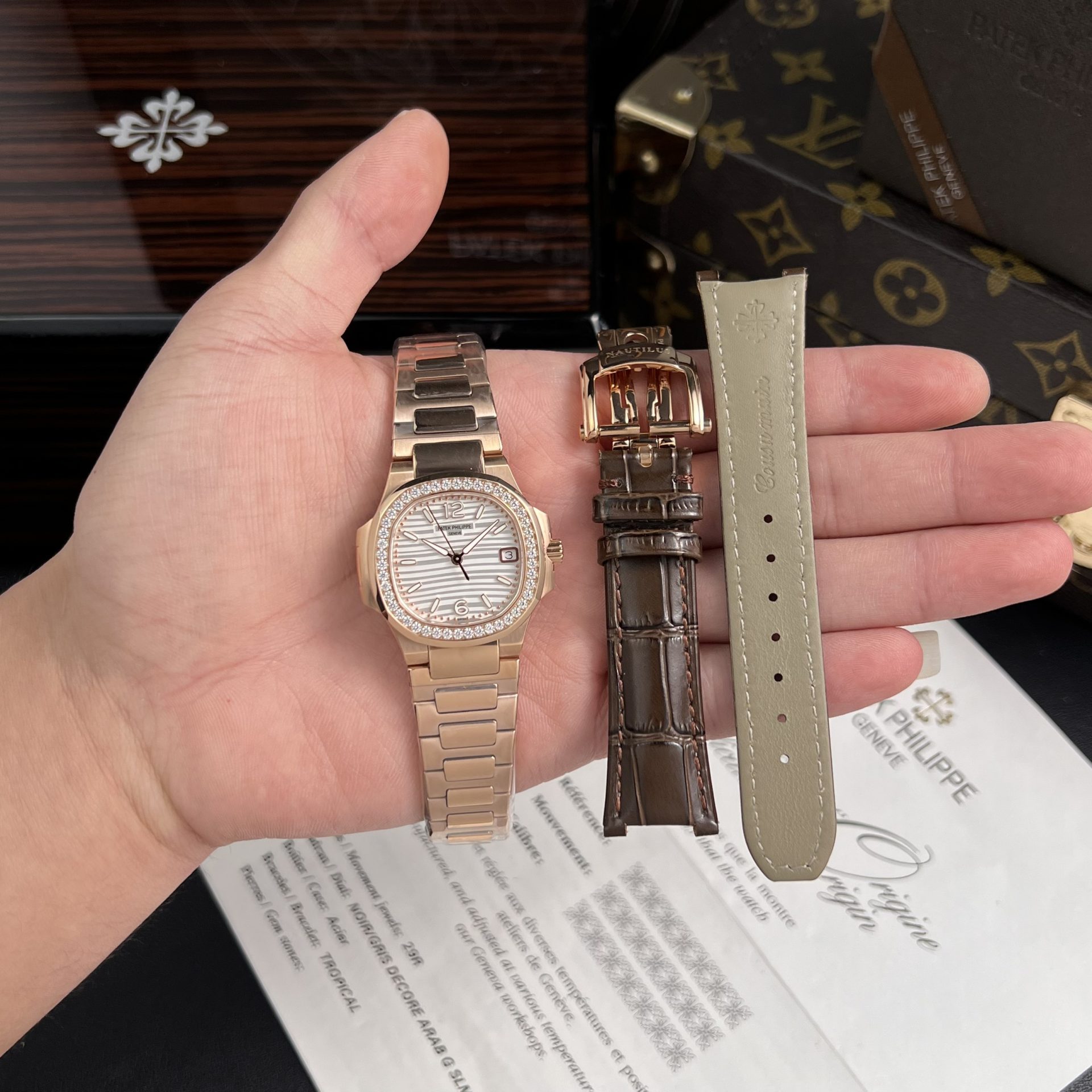 B6826D3B-B85A-5DEE-511F-7D1C7C0CA15B.jpg Patek Philippe Replica Watch Nautilus 7010 White Dial Womens GR Factory 32mm - Image 1