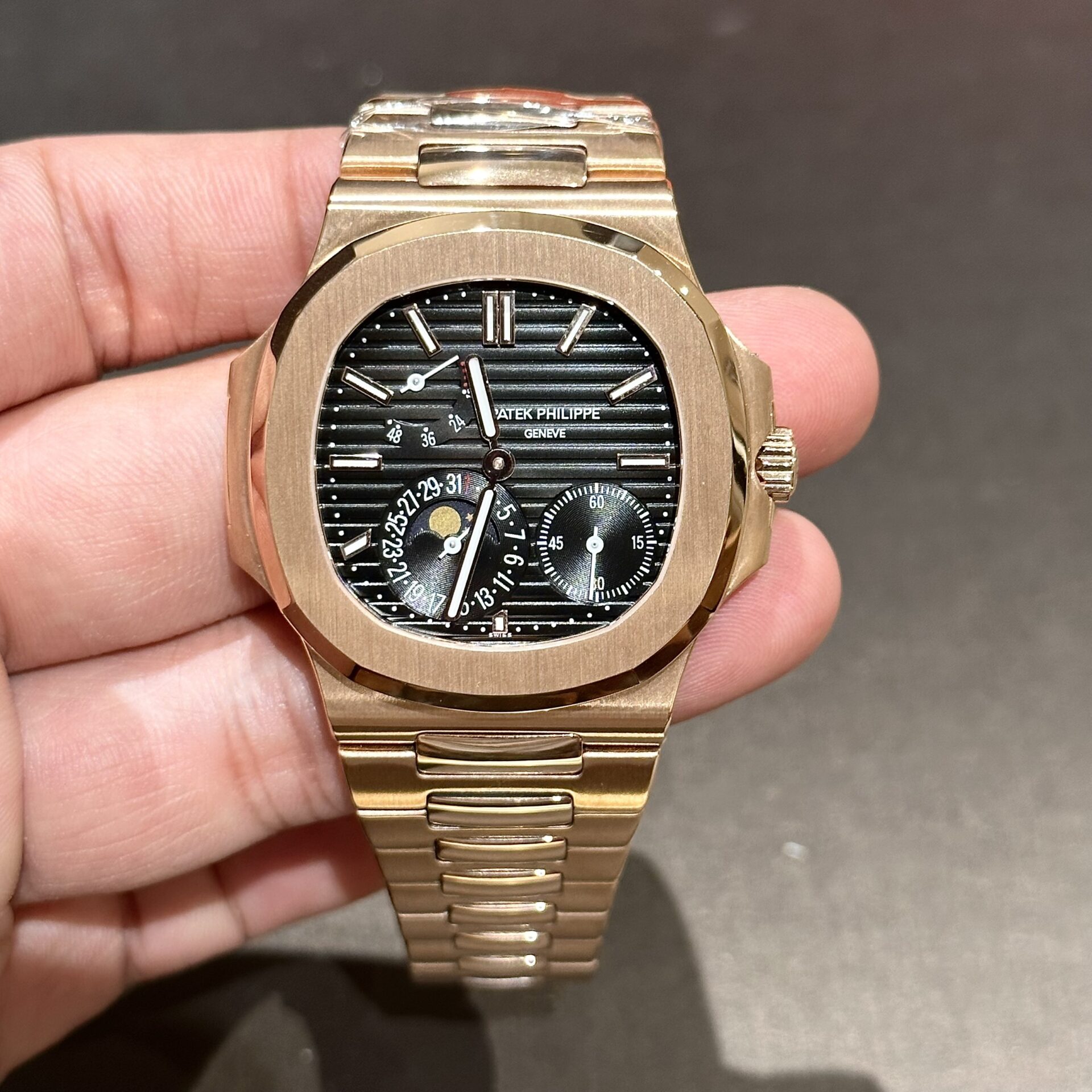 CBDAC8D0-312D-1682-6D41-F724B7AAD42A.jpg Patek Philippe Nautilus 5712 Replica Watch Black Dial GR Factory 40mm - Image 1