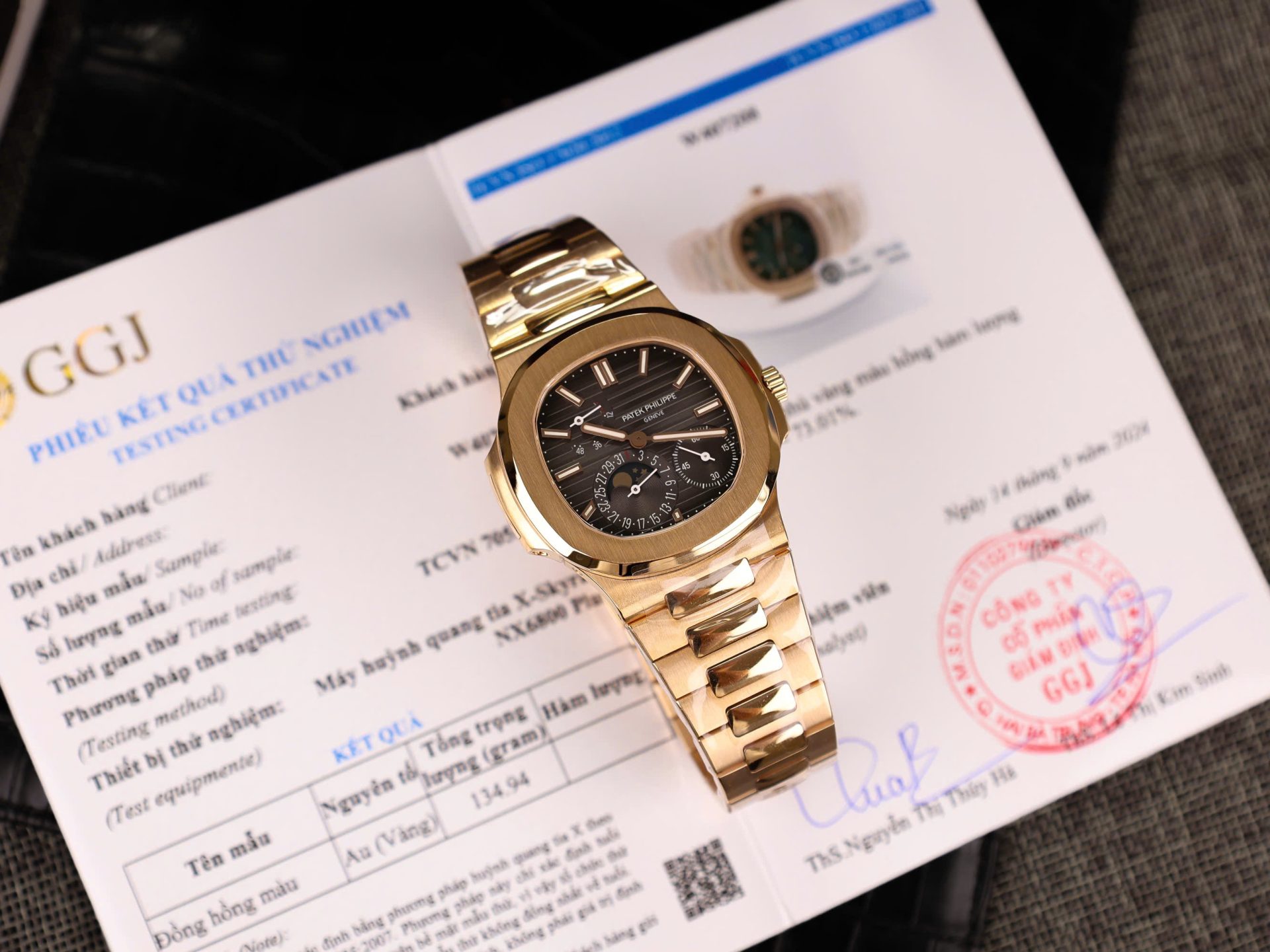 F44A51D0-4E43-8BA1-F7BC-A1B4DDD99697.jpg Patek Philippe Nautilus 5712 18K Gold Wrapped Gray Dial PPF Factory 40mm - Image 1